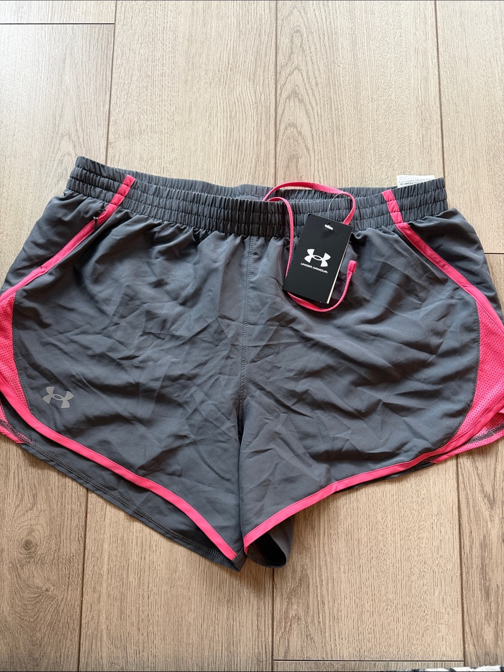 Under Armour Women's Charcoal Gray Athletic Shorts with Pink Trim